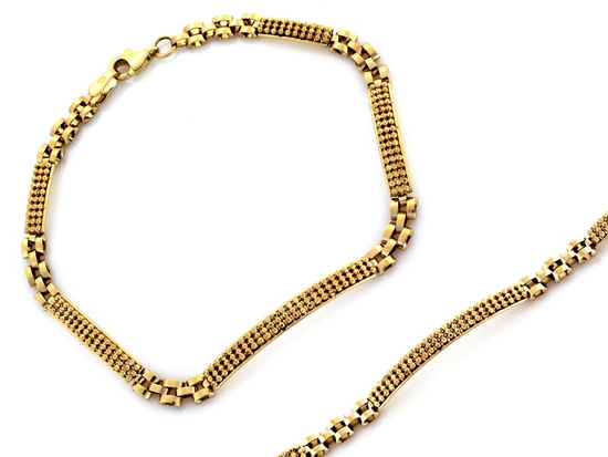 Złota bransoletka ze sztywnych elementów