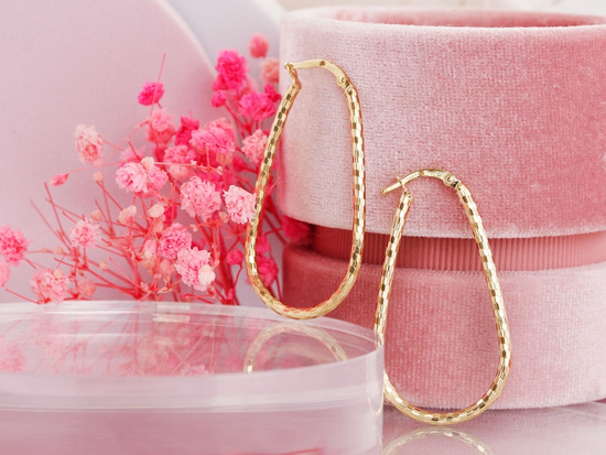 Kolczyki złote duże sztywne owalne