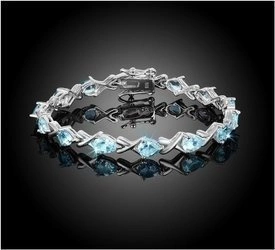 Bransoletka srebrna 925 z 14 naturalnymi południowoamerykańskimi  topazami