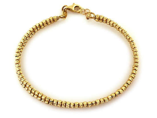 Bransoletka złota sztywna zdobiona małymi kuleczkami