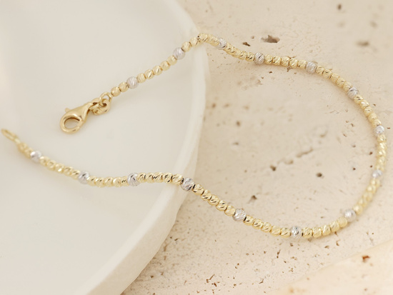 Bransoletka złota kulkami diamentowana