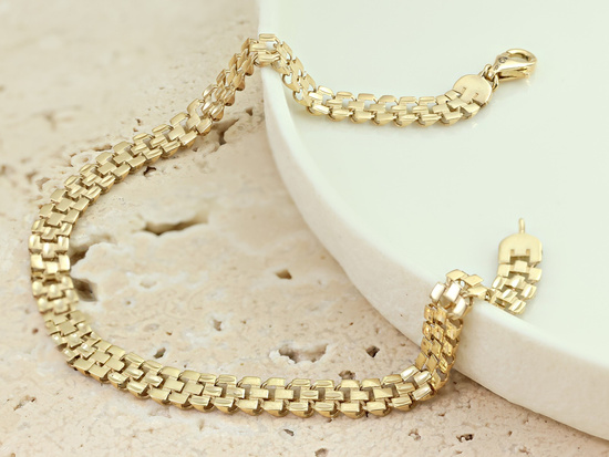 Złota bransoletka taśma z ruchomych elementów