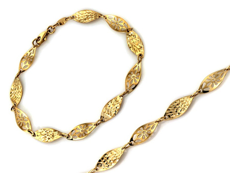 Ażurowa złota bransoletka dla kobiety