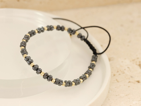 Bransoletka złota z kulkami i hematytami czarna sznurkowa