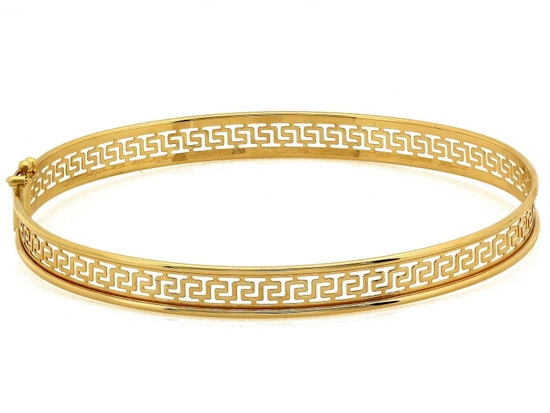 Złota sztywna bransoletka z wzorem greckim