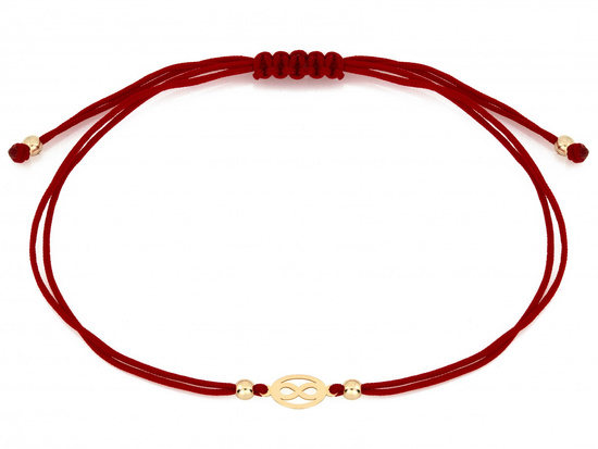Bransoletka złota delikatna nieskończoność na czerwonym sznurku