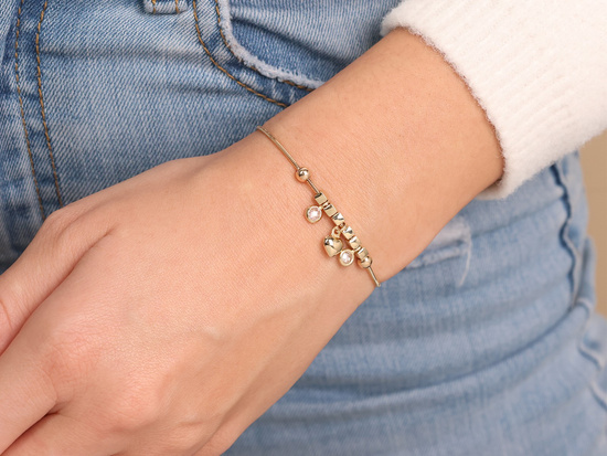 Bransoletka złota gruba linka z zawieszkami kostki kulki serce