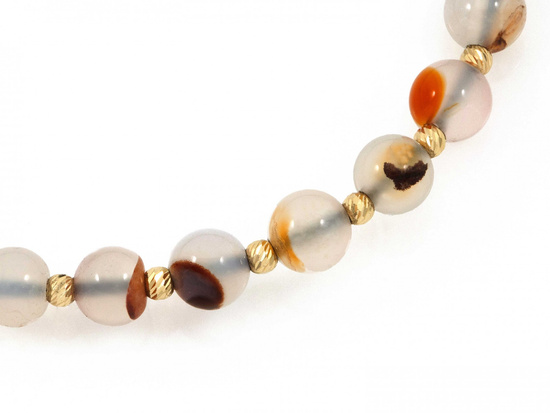 Bransoletka złota kulki i kamienie  na czarny sznurku