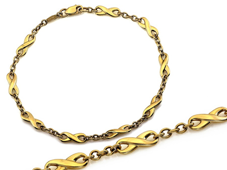 Złota bransoletka elementowa z nieskończonościami