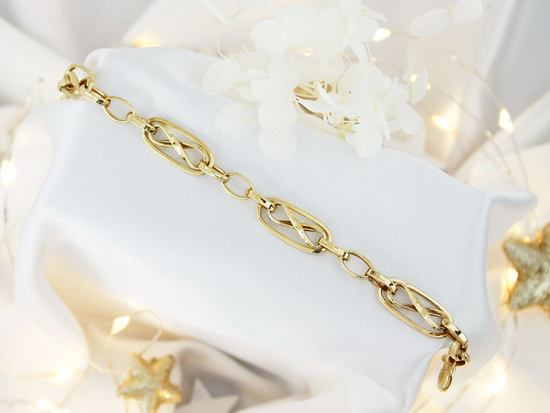 Złota bransoletka efektowna duże ogniwa z nieskończonością