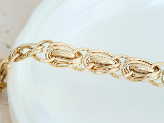 Bransoletka złota z łączonych przeplatanych ogniw