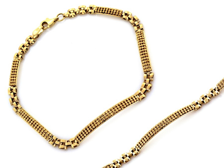 Złota bransoletka ze sztywnych elementów