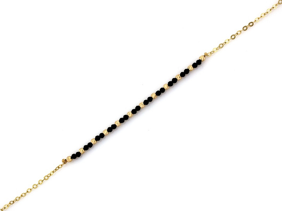 Złota delikatna bransoletka z kuleczkami i czarnymi kamieniami