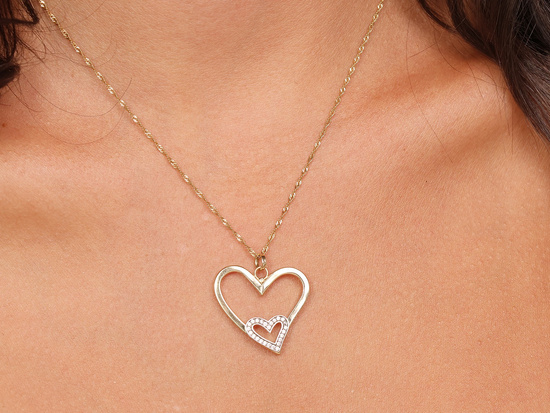 Złota zawieszka z dwóch serc z cyrkoniami