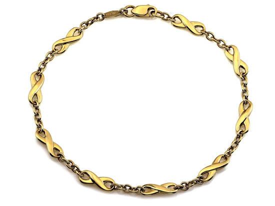 Złota bransoletka elementowa z nieskończonościami