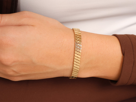 Bransoletka złota taśma z ruchomych elementów