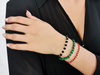 Bransoletka złota kulki i kostki z malachitów na czarnym sznurku
