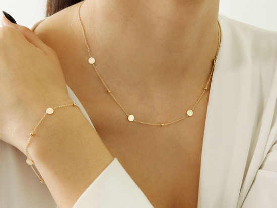 Bransoletka złota z kulkami z kółeczkami