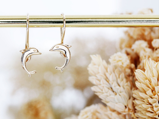 Kolczyki złote delfinki na biglu