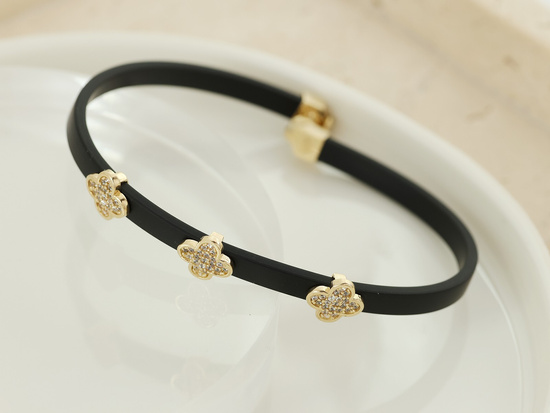 Bransoletka złota kwiatki z cyrkoniami na czarnym pasku