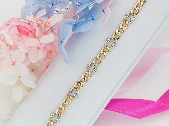 Złota bransoletka z błyszczących ogniw dwukolorowych