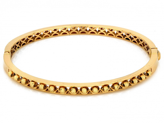 Bransoletka złota sztywna z kulkami nowoczesna