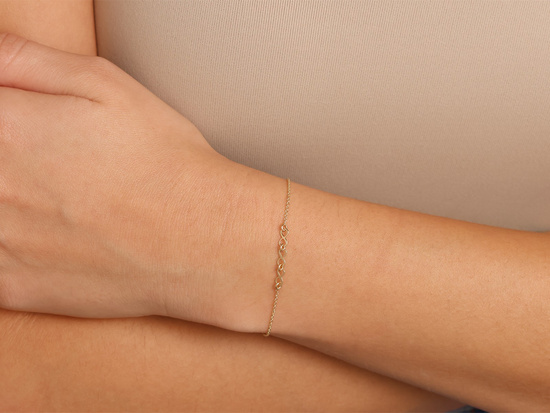 Bransoletka złota delikatna z nieskończonościami