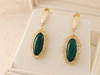 Kolczyki złote duże owalne wiszące z zielonym agatem
