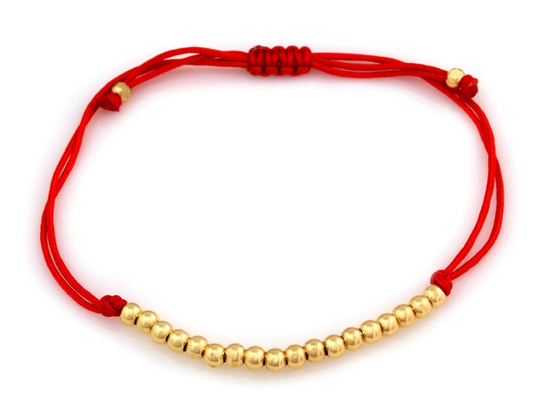 Bransoletka złota kulki na czerwonym sznurku