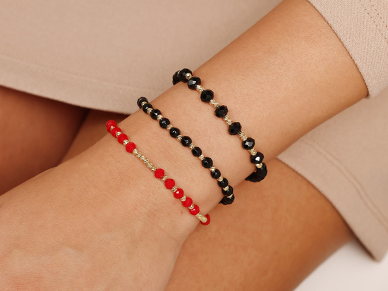 Bransoletka czerwona sznurkowa ze złotymi kulkami