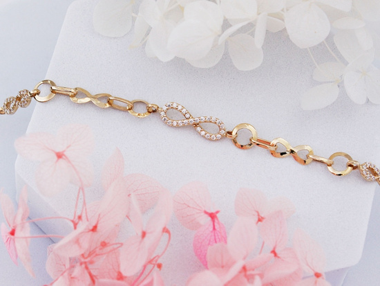 Bransoletka złota elementowa z nieskończonością z cyrkoniami