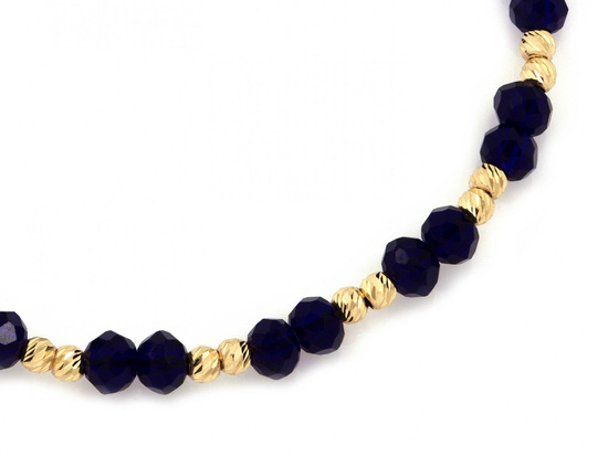 Bransoletka złota z kulkami na niebieskim sznurku