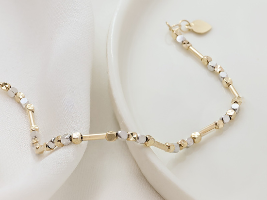 Bransoletka złota z kostkami z rureczkami