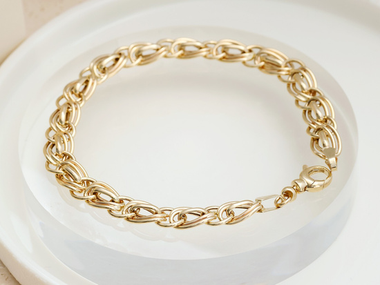 Bransoletka złota z łączonych przeplatanych ogniw