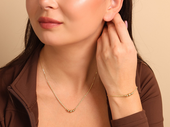 Bransoletka złota łańcuszkowa z kuleczkami