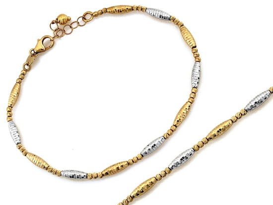 Bransoletka złota dwukolorowa z kuleczkami i podłużnymi elementami