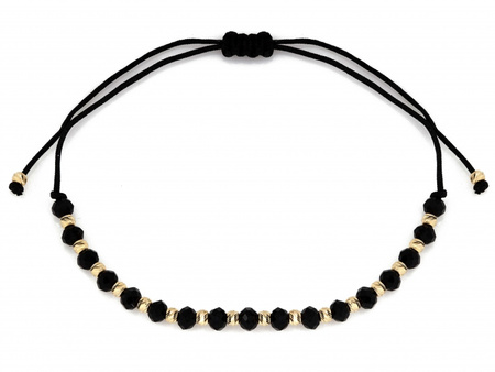 Bransoletki ze złotymi kulkami i czarnymi kamieniami na sznurku