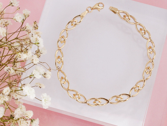 Złota bransoletka delikatna z przeplatanych ogniw