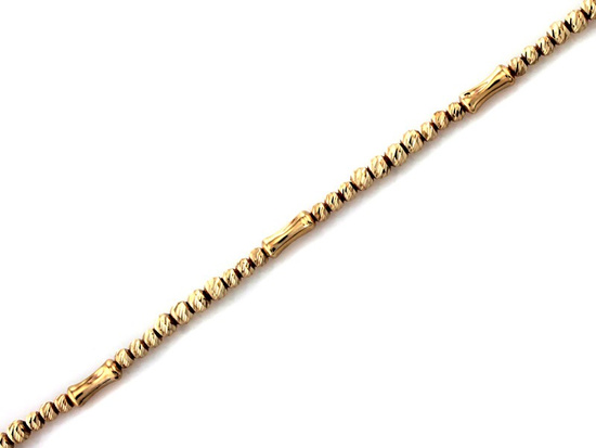 Bransoletka z błyszczących złotych kulek