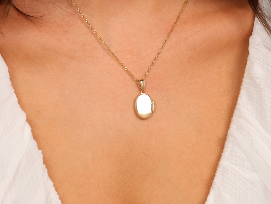 Złota zawieszka puzderko na fotografię