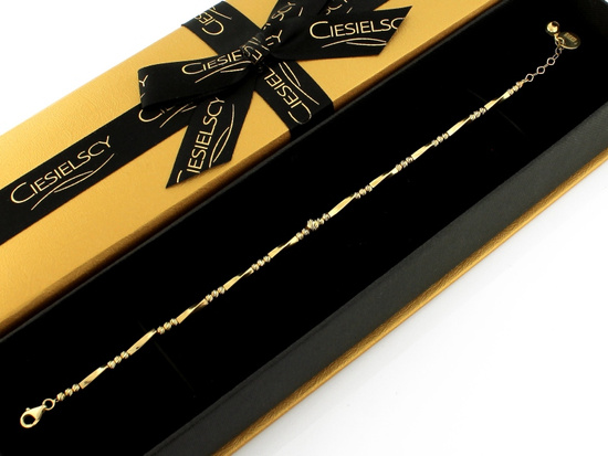 Bransoletka złota z frezowanymi kulkami i sztywnymi elementami