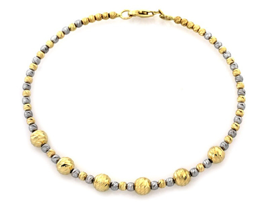 Złota bransoletka sztywna z kulkami