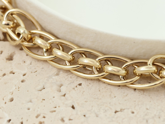 Gruba złota bransoleta damska z przeplatanych ogniw