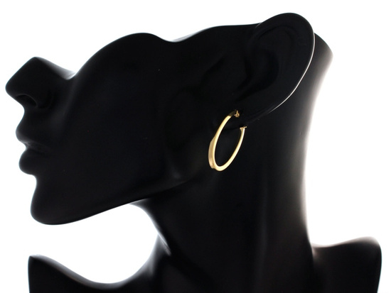 Złote kolczyki długie owalne sztywne