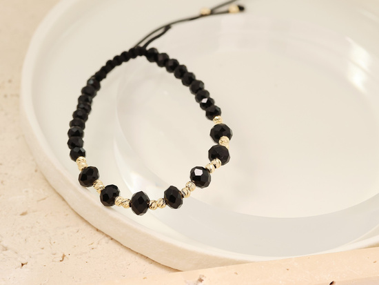 Bransoletka złote kulki i czarne onyksy na czarnym sznurku