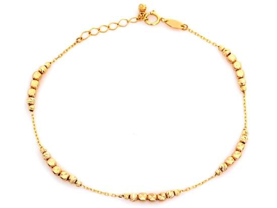 Bransoletka złota z kulkami i kostkami