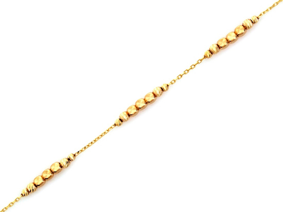 Bransoletka złota z kulkami i kostkami