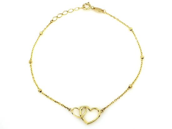 Bransoletka złota łańcuszkowa dwa serca  kulkami