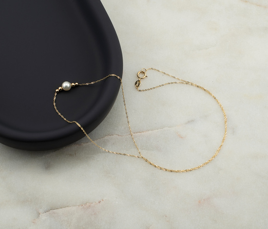 Złoty naszyjnik 585 z perłą i kuleczkami