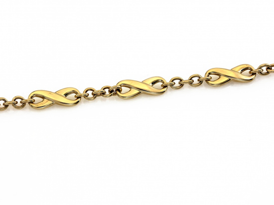 Złota bransoletka elementowa z nieskończonościami